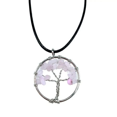 A gemstone tree of life pendant with silver wire and rose quartz chips on a black cord