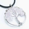 Silver wire-wrapped gemstone tree of life pendant with rose quartz chips on a black leather cord