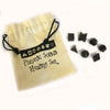 Black stone seven piece crystal set with platonic solids made of black agate in a beige drawstring bag