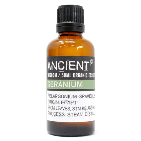 Amber glass bottle with black cap labeled ancient wisdom 50ml geranium organic essential oil for aromatherapy