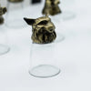 Antique bronze shot glass with a brass fox head featuring detailed fur and a clear inverted stem from mystical creatures set