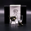 Gold elephant-shaped stopper and base set for clear glass shot glasses featuring mystical creatures in antique bronze style