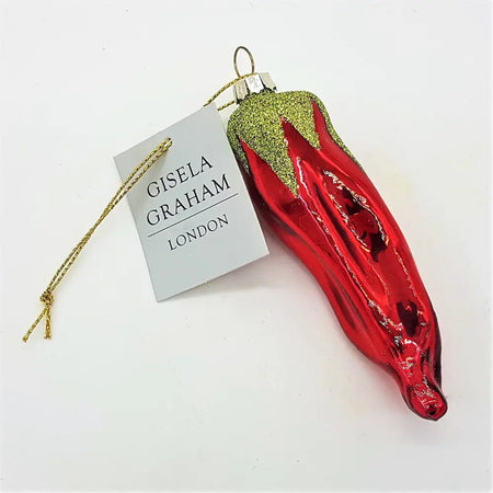 A glossy red glass chilli pepper bauble with green glittery top by gisela graham for christmas decor