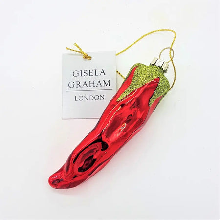 A glossy red glass chilli pepper bauble with a glittery green stem and gold loop by gisela graham london