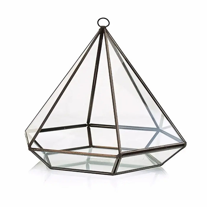 Large diamond glass and brass terrarium with geometric shape, clear panels, and dark metal frame for plants or decor