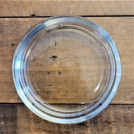 Clear glass church candle stand with smooth circular design and ridged rim fits pillar candles up to 8cm diameter