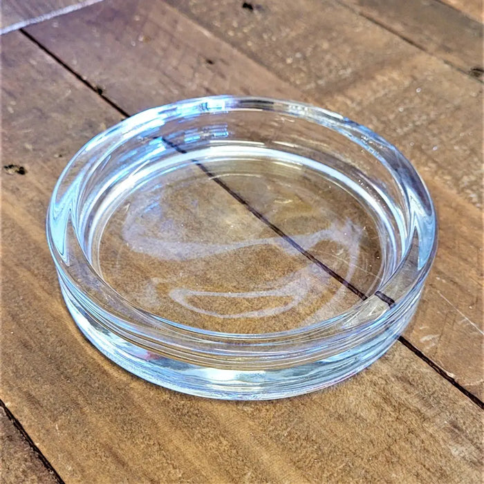 Clear glass church candle stand with concentric ridges fits pillar candles up to 8cm diameter for christmas use