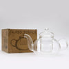 Clear glass infuser teapot with built-in infuser and rounded body featuring curved spout and handle 800ml capacity