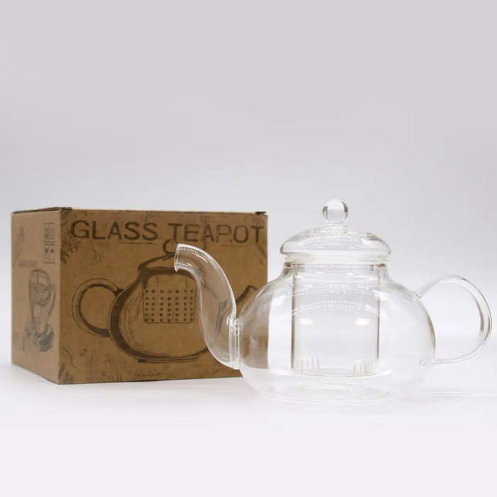 Clear glass infuser teapot with built-in infuser and rounded body featuring curved spout and handle 800ml capacity