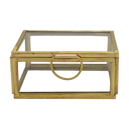 The Window, Milford Haven small rectangular glass jewellery box with a gold metal frame and circular handle.