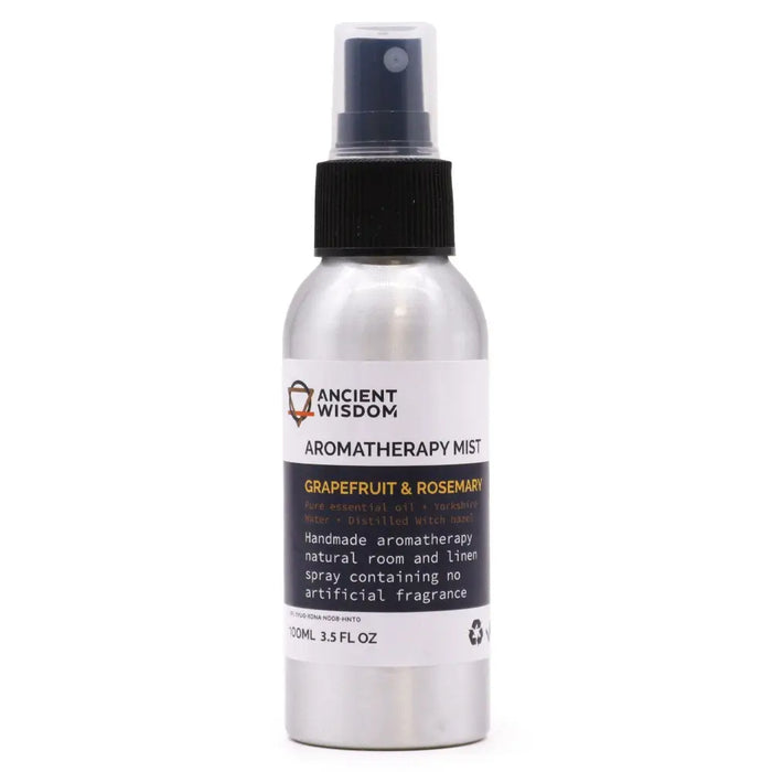 A sleek silver aluminum spray bottle of grapefruit and rosemary essential oil mist to reduce stress levels