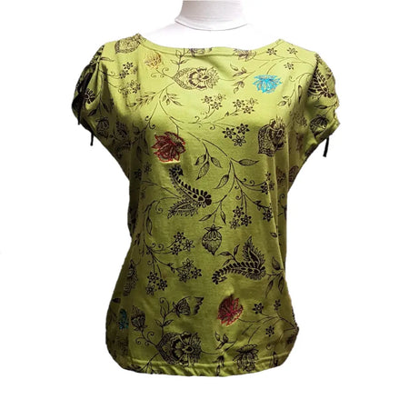 A lime green cotton tank vest with embroidered flowers in black red and blue short sleeves and floral pattern
