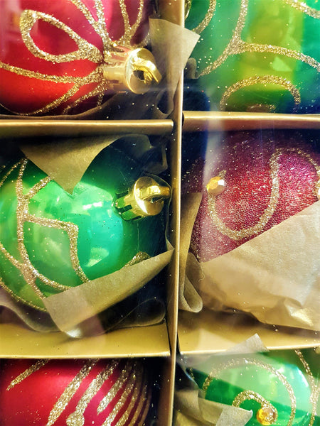Green and red shatterproof glass Christmas baubles with gold glitter swirls and metallic caps set of 9
