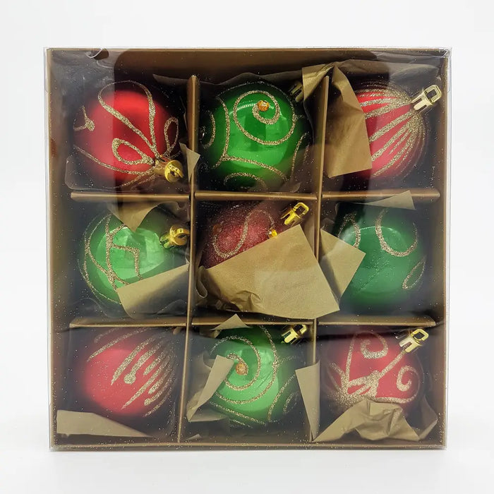 Set of nine green and red shatterproof glass christmas baubles with gold glitter swirls and metallic caps