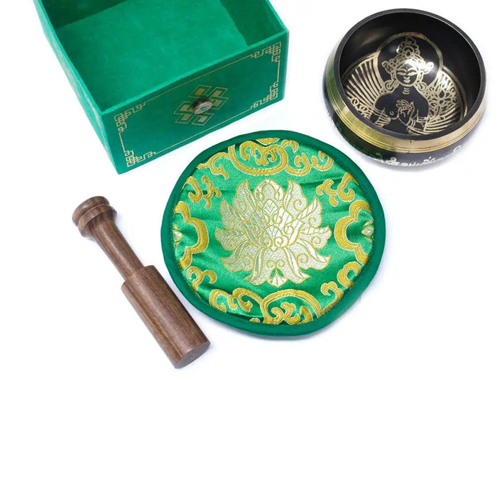 Green tara singing bowl set 10cm with a green silk cushion featuring a gold embroidered lotus design