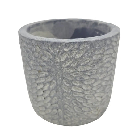 Gray concrete plant pot with a textured pebble surface and subtle radial pattern for indoor or outdoor use