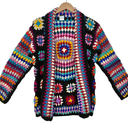 A vibrant black multicolour gringo fairtrade 100% wool crochet knit open cardigan with patchwork circles and floral motifs