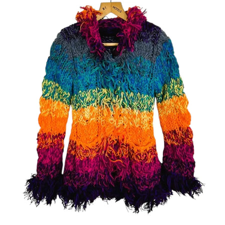 A vibrant multicolored knitted wool cardigan with a fuzzy texture and fringe details on the collar and hem