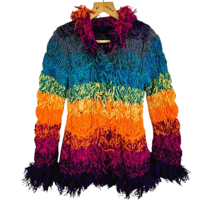 A vibrant multicolored knitted wool cardigan with a fuzzy texture and fringe details on the collar and hem