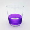 Clear glass votive tealight holder with a vibrant purple ribbed band around the lower half in glass material