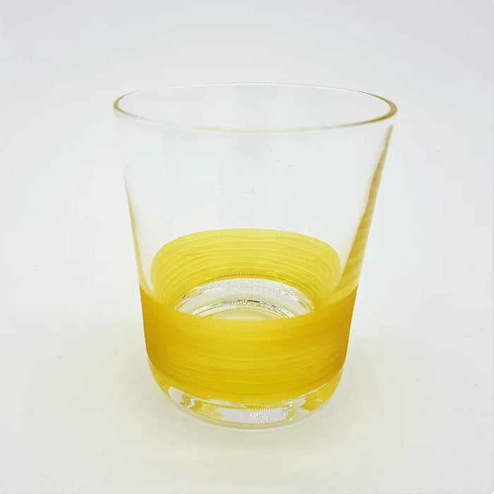 Clear glass votive tealight holder with a vibrant yellow swirling band near the base in four colour options