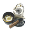 Black hand-beaten engraved singing bowl with gold geometric inlay wooden mallet and cloth in a bowl gift set