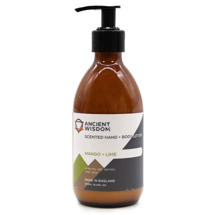 A sleek amber glass bottle of ancient wisdom body lotion with black pump in mango and lime scented seed oil formula