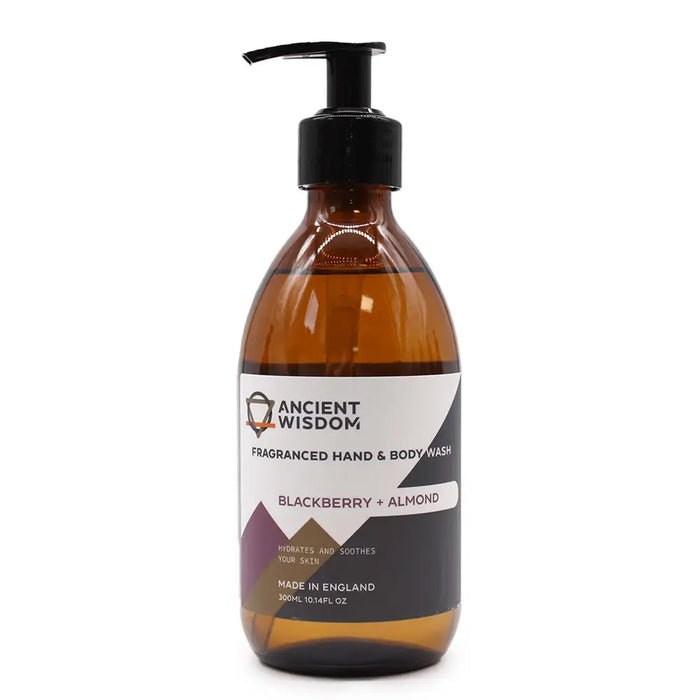 A sleek amber glass bottle with black pump labeled ancient wisdom fragranced hand and body wash blackberry almond