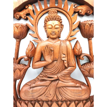 Hand carved wooden plaque of buddha with lotus flowers in amber finish featuring sunburst rays and detailed carving