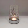 Clear glass tealight lantern with lavender design hand-painted in purple and green on a gray metal base