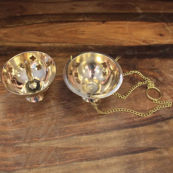 Hanging brass incense burner with golden clover cutouts and chain made for charcoal and resin use