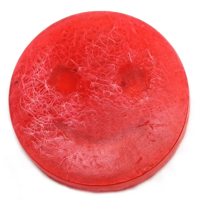 Happy scrub soap bar in vibrant red with textured fibrous surface and smiley face design scrub soap bar
