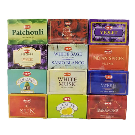 A collection of hem hexagonal pack incense sticks in assorted vibrant colors with floral and aromatic-themed designs