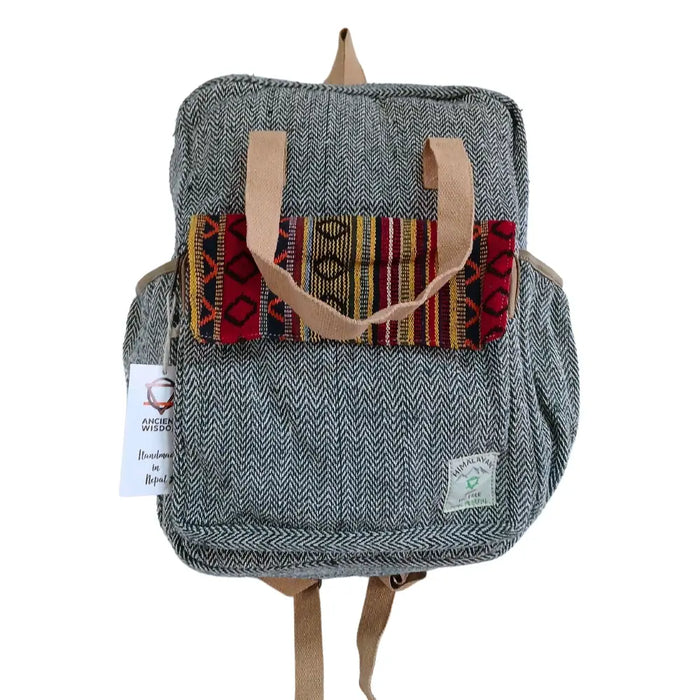 Hemp adventure backpack Annapurna in gray herringbone with tan leather straps and colorful woven patch details
