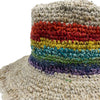 Hand-knitted cotton festival hat with natural beige brim and vibrant rainbow stripe pattern made from hemp and cotton