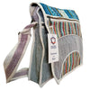 Handwoven multicolored hemp laptop messenger bag with herringbone and striped textile panels and white stitched trim
