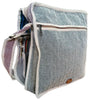 A black and white herringbone woven laptop messenger bag with cream trim and zipper closure for everyday use