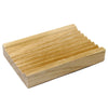 Light-colored hemu wood soap dish with parallel grooves designed for holding soap bars and draining water