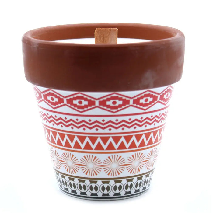 Terracotta pot candle with red white and black geometric patterns featuring soy wax mint herb garden scent