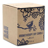 A brown cardboard box with black bird and floral illustrations labeled aromatherapy soy wax candle mint 210 g
