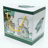 White and green gift box with an ornate porcelain teapot illustration and yellow twisted handles for herbal teapot set
