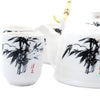 White ceramic herbal teapot set with elegant black bamboo brushwork and subtle red calligraphy accents