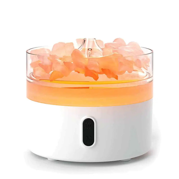 White and translucent orange electric dehydrator with clear lid holding pink flower slices for himalayan salt aroma diffuser use