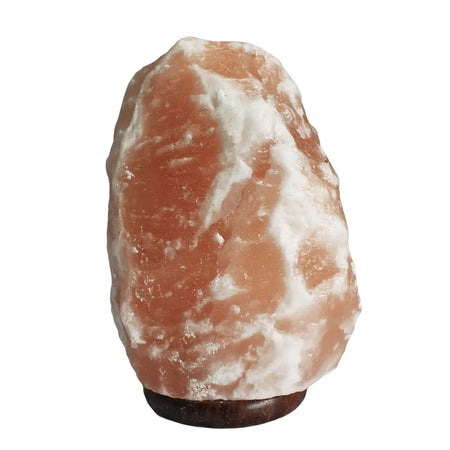 A polished pink himalayan salt lamp with white veins on a dark wooden base known for hygroscopic properties in humid conditions