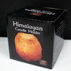 Black box packaging for a himalayan salt tealight holder featuring an orange-hued natural stone image