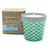 Teal honeycomb ceramic candle pot with light gray rim filled with white soy wax home is home fruit basket design