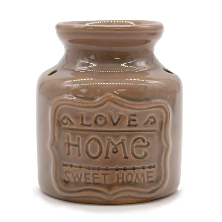 Brown ceramic home oil burner with love home sweet home embossed label in beige for cozy home use