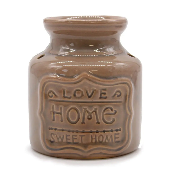 Brown ceramic home oil burner with love home sweet home embossed label in beige for cozy home use