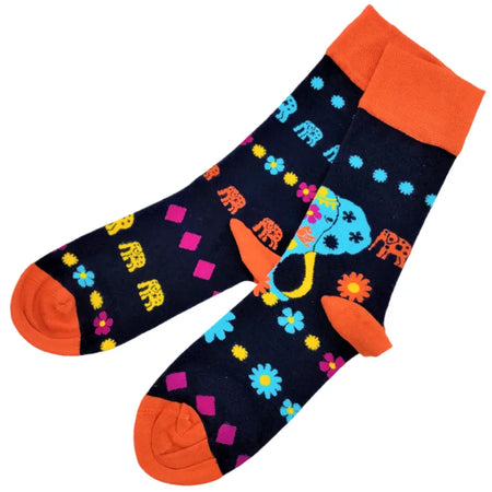 Black bamboo socks with bright orange blue yellow and pink elephant and flower patterns on dark background