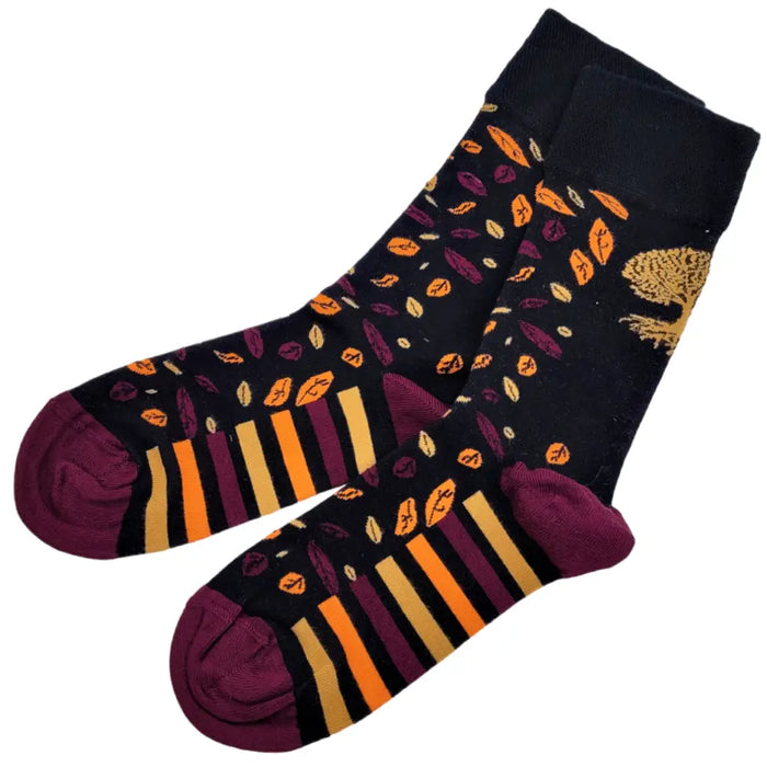 Black hop hare bamboo socks with orange purple yellow leaf pattern and matching bold stripes on toe area